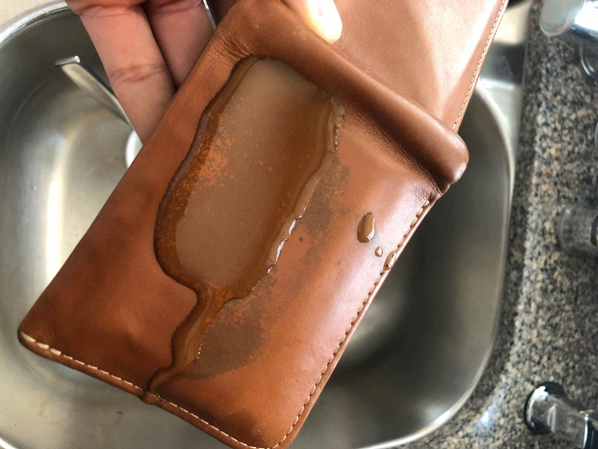 bellroy hide & seek wallet with water poured on it